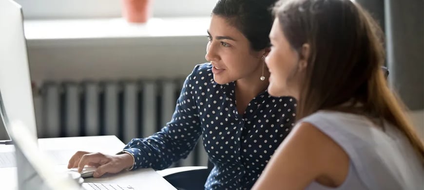 Two women at a computer
