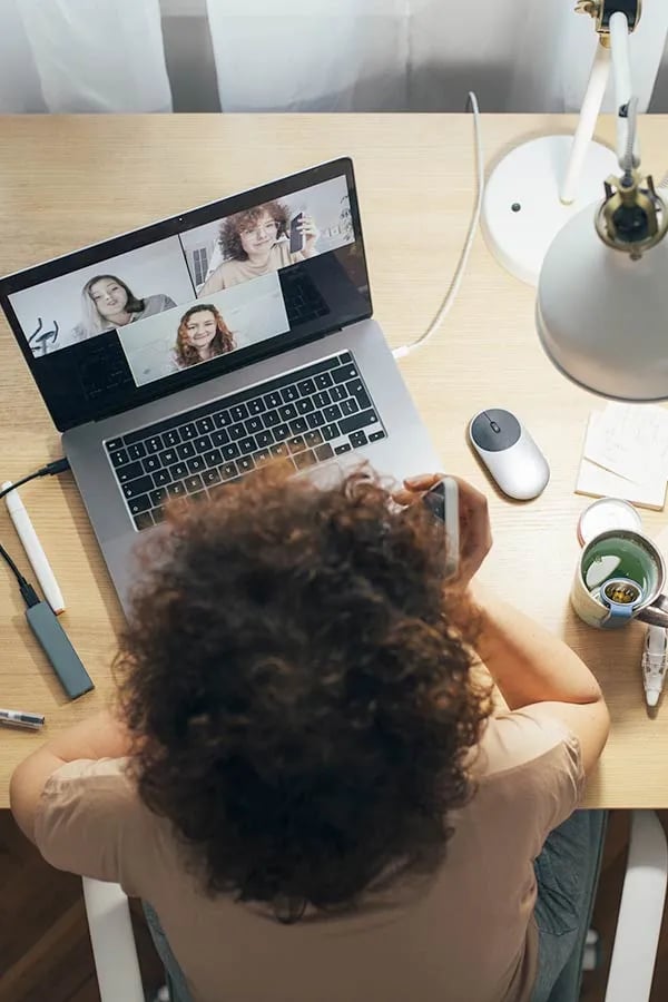 A women works on a laptop computer